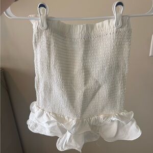 The Impeccable Pig White Smocked Ruffle Skirt